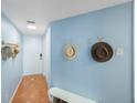 Bright entryway with tiled floor and bench at 6051 Sun Blvd # 504, St Petersburg, FL 33715