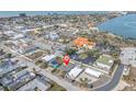 Aerial view of property, showcasing its location near water at 117 73Rd Ave, St Pete Beach, FL 33706