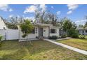 Front view of a charming house with a well-maintained lawn at 2934 3Rd S Ave, St Petersburg, FL 33712