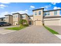 Modern townhome community with attractive landscaping at 29913 Southwell Ln, Wesley Chapel, FL 33543