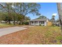 Newly renovated home with a large yard and driveway at 5712 17Th N Ave, St Petersburg, FL 33710