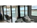 Living room with amazing water views and balcony access at 6265 Sun Blvd # 906, St Petersburg, FL 33715