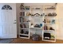 Bright entryway with built-in shelving and workspace at 8101 113Th Street St # 107, Seminole, FL 33772