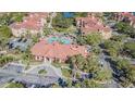 Resort-style community pool with surrounding lounge area at 2724 Via Murano # 631, Clearwater, FL 33764