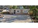 Well-maintained house with a newly paved driveway at 301 3Rd Sw Ave, Largo, FL 33770