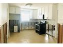 Kitchen renovation in progress with new cabinets and appliances at 4135 Helena Ne St, St Petersburg, FL 33703