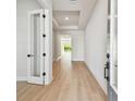 Bright and spacious entryway with light wood flooring at 5917 Hidden Branch Dr, Apollo Beach, FL 33572
