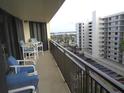 Balcony overlooking the parking lot and neighboring building at 690 Island Way # 802, Clearwater Beach, FL 33767