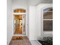 Inviting entryway with a decorative doormat and view of the interior at 10038 Reagan Dairy Trl, Bradenton, FL 34212
