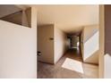 Condo hallway with light beige walls and flooring at 2795 Kipps Colony S Dr # 104, St Petersburg, FL 33707
