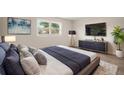 Spacious bedroom with a king-size bed and modern dresser at 3100 Hartford N St # 224, St Petersburg, FL 33713