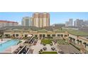 Resort-style pool and deck with city views at 450 Knights Run Ave # 705, Tampa, FL 33602