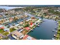 Wide aerial view showcasing home's waterfront location in a residential community at 4500 38Th S St, St Petersburg, FL 33711