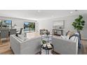Bright and airy living room featuring modern sofas and a view at 5215 Dover Ne St, St Petersburg, FL 33703