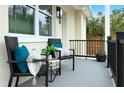 Cozy front porch with seating area, perfect for relaxing outdoors at 979 11Th S Ave, St Petersburg, FL 33705