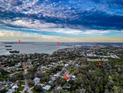 Aerial view of home near Honeymoon Island and Dunedin Causeway at 1825 San Mateo Dr, Dunedin, FL 34698