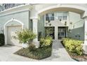 Well-maintained townhome with a private entry and lush landscaping at 2135 Park Crescent Dr, Land O Lakes, FL 34639