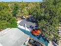 House with backyard and a view of surrounding neighborhood at 3020 Deleuil Ave, Tampa, FL 33610