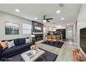 Open living room with fireplace and modern decor at 3020 Deleuil Ave, Tampa, FL 33610
