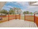 Spacious wooden deck overlooking the backyard at 3111 Bay Ln, Clearwater, FL 33759