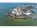 Wide aerial view of waterfront home and surrounding community at 495 Bath Club N Blvd, North Redington Beach, FL 33708