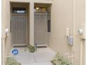 Two-unit entryway with taupe doors, ADT security at 5152 Bay Isle Cir, Clearwater, FL 33760