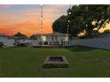 Spacious backyard with a fire pit and a deck at 6108 Pershing Ne St, St Petersburg, FL 33703