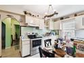 Bright kitchen with ample cabinetry and stainless steel appliances at 704 E Broad St, Tampa, FL 33604