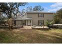 House exterior showcasing a stone patio at 8575 Carey Rd, Lithia, FL 33547