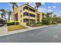 Condo building exterior with parking at 13602 S Village Dr # 1112, Tampa, FL 33618