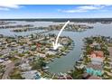 Bird's-eye view of waterfront home and surrounding neighborhood at 16015 Redington Dr, Redington Beach, FL 33708