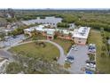 Aerial view of the property, showcasing the building, parking and landscaping at 2900 45Th S St # 22, Gulfport, FL 33711