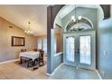 Bright dining room with a table and chairs, adjacent to the foyer at 4101 Concord Way, Plant City, FL 33566