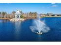 Gazebo and fountain in a lake within a community at 20292 Sea Glass Cir, Land O Lakes, FL 34638