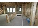 Under construction interior showing framing for a kitchen island and windows at 441 42Nd Ne Ave, St Petersburg, FL 33703