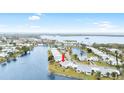 Aerial view showcasing a waterfront community with lush landscaping at 4519 Lexington Cir # 4519, Bradenton, FL 34210