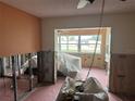 Under construction living room with new drywall and flooring at 4712 Marine Pkwy # 103, New Port Richey, FL 34652