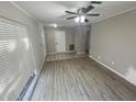 Living room featuring vinyl flooring and neutral wall colors at 5205 Landsman Ave, Tampa, FL 33625