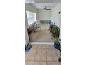 Under renovation living room with tile flooring and new walls at 7063 S Shore S Dr, St Petersburg, FL 33707