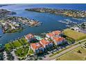 Stunning aerial view of waterfront property with private boat slips and marina access at 1030 Bellasol Way # 402, Apollo Beach, FL 33572