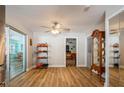 Bright dining area with hardwood floors and view to living room at 11453 Imperial Grove E Dr, Largo, FL 33774