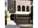 Stunning two-story home with stylish facade at 128 Adriatic Ave, Tampa, FL 33606