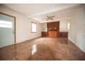 Spacious living room with tiled floors and ceiling fan at 3712 56Th N Ave, St Petersburg, FL 33714