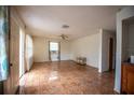 Living room with tile floors and ceiling fan at 3712 56Th N Ave, St Petersburg, FL 33714