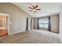 Relaxing main bedroom with lake views and neutral decor at 6944 Runner Oak Dr, Wesley Chapel, FL 33545