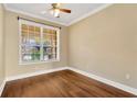 Bright office with hardwood floors and large window at 10112 Haverhill Ridge Dr, Riverview, FL 33578