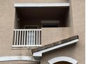 Small balcony with white railing and exterior door at 10535 Villa View Cir # 10535, Tampa, FL 33647
