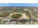 Aerial view of house and neighborhood, showcasing the property's location and surrounding area at 12311 Silton Peace Dr, Riverview, FL 33579