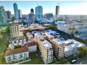 Drone shot showcasing a condo building and its surrounding cityscape at 130 4Th N Ave # 414, St Petersburg, FL 33701
