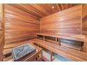 Relaxing wooden sauna with built-in benches at 400 Island Way # 1508, Clearwater Beach, FL 33767